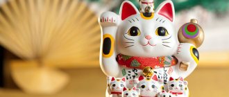 Манеки-неко: японская кошка-талисман